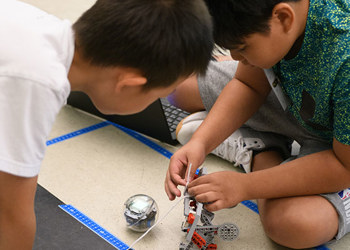 students work on robot