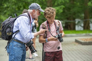 Students taking pictures in Wild About Photography course