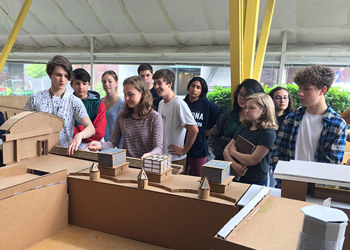 students and cardboard model